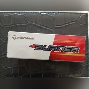 Nwb. Taylor Made Burner White 1 pack of 3 Golf Balls
